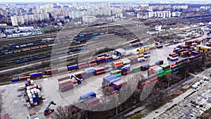 Aerial view of cargo containers on the railyard. Freight transport. Warsaw, Poland