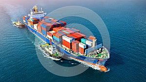 Aerial view of cargo ship with cargo container on sea