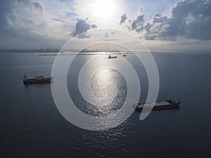 Aerial view of cargo ship, cargo container in warehouse harbor a