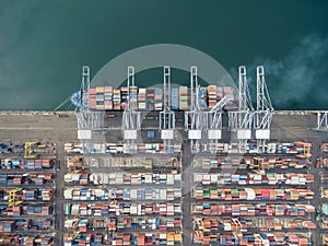 Aerial view of cargo ship, cargo container in warehouse harbor a