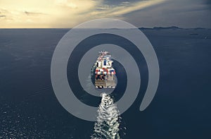 Aerial view of cargo ship, cargo container in warehouse harbor a