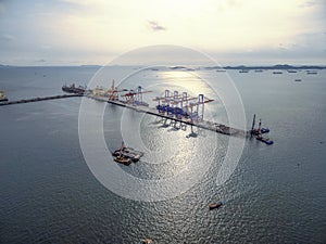 Aerial view of cargo ship, cargo container in warehouse harbor a