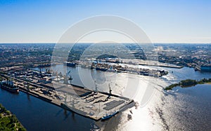 Aerial view of cargo ship, cargo container in warehouse harbor in the Morskie Vorota district in St. Petersburg