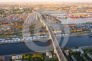 Aerial view of cargo ship, cargo container in warehouse harbor in the Morskie Vorota district in St. Petersburg