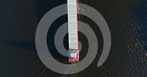Aerial view of cargo ship - container ship - support vessel in motion