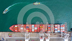 Aerial view cargo ship terminal, Unloading crane of cargo ship terminal, Aerial view industrial port with containers and container