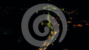 Aerial view of cars driving on the roads during the night