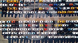 Aerial view Cars For Sale. Automotive Industry. Cars Dealership Parking Lot. Rows of Brand New Vehicles Awaiting New Owners