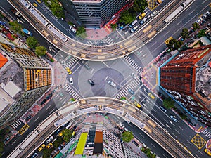 Aerial view of cars and trains with intersection or junction with traffic, Taipei Downtown, Taiwan. Financial district and