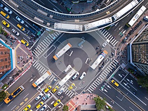 Aerial view of cars and trains with intersection or junction with traffic, Taipei Downtown, Taiwan. Financial district and