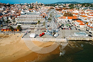 Aerial view of Cascais bay, Portugal with giant ferris wheel visible which was set up for the Christmas season photo