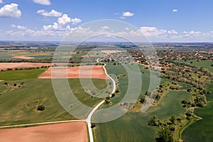 Aerial view of a Castilian countryside with country houses and plots of land photo