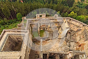 Aerial view of castle courtyard and ruins of Landstejn Castle. Scenic landscape of castle in the forest