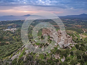 Aerial view of the Castle of Vatika or Castle of Agia Paraskevi at sunset. The castle is located in Mesohori village and has a