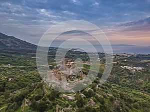 Aerial view of the Castle of Vatika or Castle of Agia Paraskevi at sunset. The castle is located in Mesohori village and has a