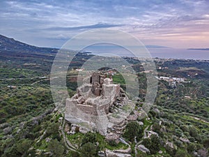 Aerial view of the Castle of Vatika or Castle of Agia Paraskevi at sunset. The castle is located in Mesohori village and has a