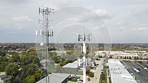 Aerial view of cellular wireless mobile data tower for mobile network. American suburban neighborhood