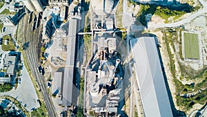 Aerial view of cement manufacturing plant. Concept of buildings at the factory, steel pipes, giants.