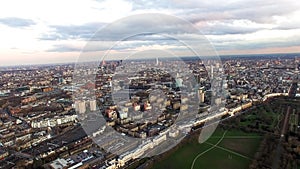 Aerial View Central London Cityscape with Dusk Sky around Regent`s Park and Camden Town photo