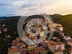 Aerial view Cervo medieval town on the mediterranean coast, Liguria riviera, Italy, with the beautiful baroque church and tower be