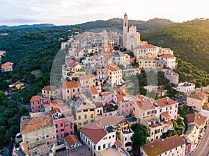 Aerial view Cervo medieval town on the mediterranean coast, Liguria riviera, Italy, with the beautiful baroque church and tower be