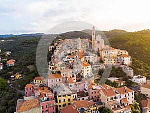 Aerial view Cervo medieval town on the mediterranean coast, Liguria riviera, Italy, with the beautiful baroque church and tower be