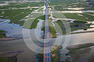 Aerial view of Chalerm Phra Kiat road at daytime in Thale Noi, Phatthalung, Thailand