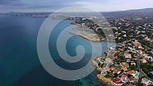 Aerial view of chalets and villas at first hour in the mornig.