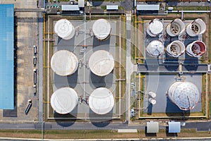 Aerial view of Chemical industry storage tank and tanker truck In wailting in Industrial Plant to tranfer oil to gas station