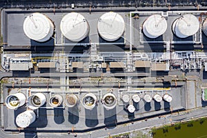 Aerial view of Chemical industry storage tank and tanker truck In wailting in Industrial Plant to tranfer oil to gas station