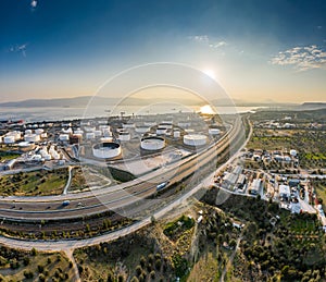 Aerial view of Chemical plant at sunset, oil refining, smoke, pipes, ecology pollution, air infection, coast of sea in