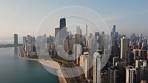 Aerial view of the Chicago, America. Busy downtown, city centre on the shore of the Michigan lake on the dawn.