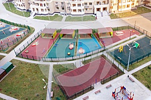 Aerial view children playground and sport activities residential area people community spring time