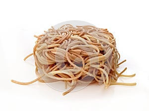 Aerial view of Chinese Egg Noodles on white background. Close up of Spaghettis. Nutrition and Food. Fried noodle strand pack