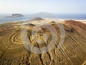 Aerial view of Chinijo Archipelago of La Graciosa, Lanzarote, Canary Islands. Spain. La Aguja Grande mountain