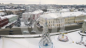 Aerial view, Christmas tree in the city square with beautiful toys and garlands