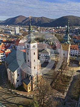 Aerial view of churches and Barbakan in Banska Bystrica during winter photo