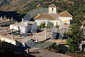 Aerial view of church and houses in Bubion