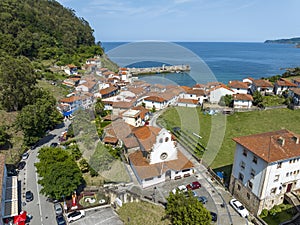 Aerial view Church of Iglesia San Miguel in Tazones Asturias Spain