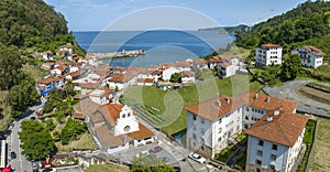 Aerial view Church of Iglesia San Miguel in Tazones Asturias Spain