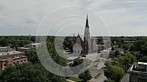 Aerial view of Church and residential urban housing district in Naperville USA. pool. Many homes and houses.