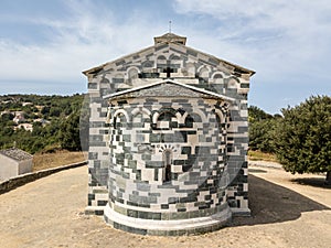 Aerial view of the church of San Michele de Murato, bell tower and apse. Corsica, France