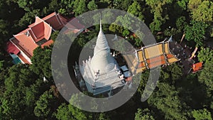 Aerial view circle around Wat Phnom, a religious attraction in Cambodia higher