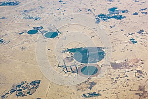 Aerial view of circular fields in the desert