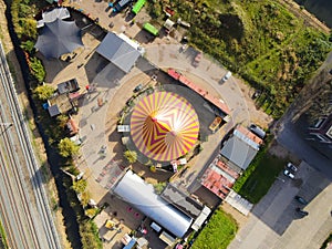 Aerial view of a circus tent colorfull red yellow entertainment show drone shot
