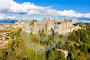 Aerial view of Cite de Carcassonne, a medieval hilltop citadel in the French city of Carcassonne, Aude, Occitanie, France. photo