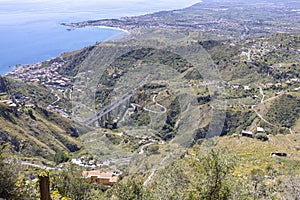 Aerial view of city on the bay of the Ionian Sea from Castle of Mola, Castelmola, Sicily, Italy