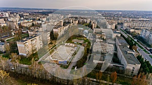 Aerial view of the city buildings in early spring on the sunset.