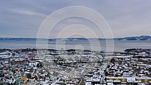 Aerial view of the city center in spring in Trondheim, Norway with snow