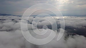 Aerial view of the city of Dolny Kubin through the clouds in Low Tatras